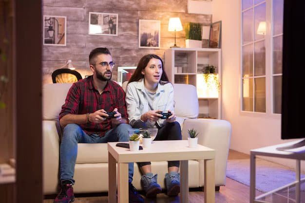young-couple-having-good-time-while-playing-video-games-television-couple-sitting